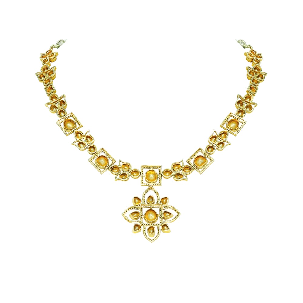 Polki Necklace with Floral Motifs and Lotus-Inspired Pendant